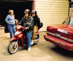 Leslie and Rachel head out on the scooter